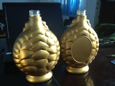 酒瓶噴涂絲印燙金貼花加工的價(jià)格與廠家選擇指南